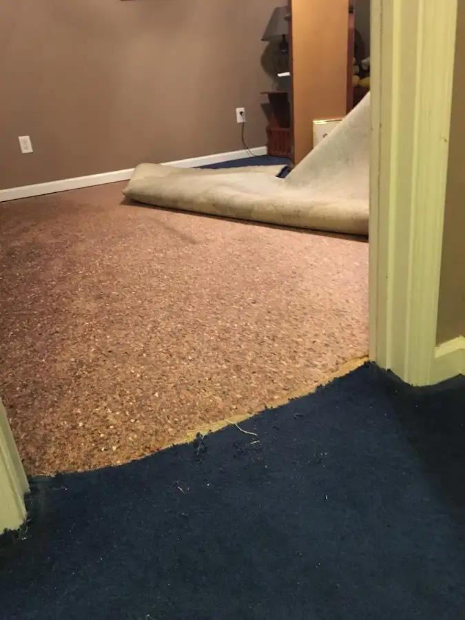 Carpet pad removal revealing water damage during Drying & Dehumidification in Pleasant Hill